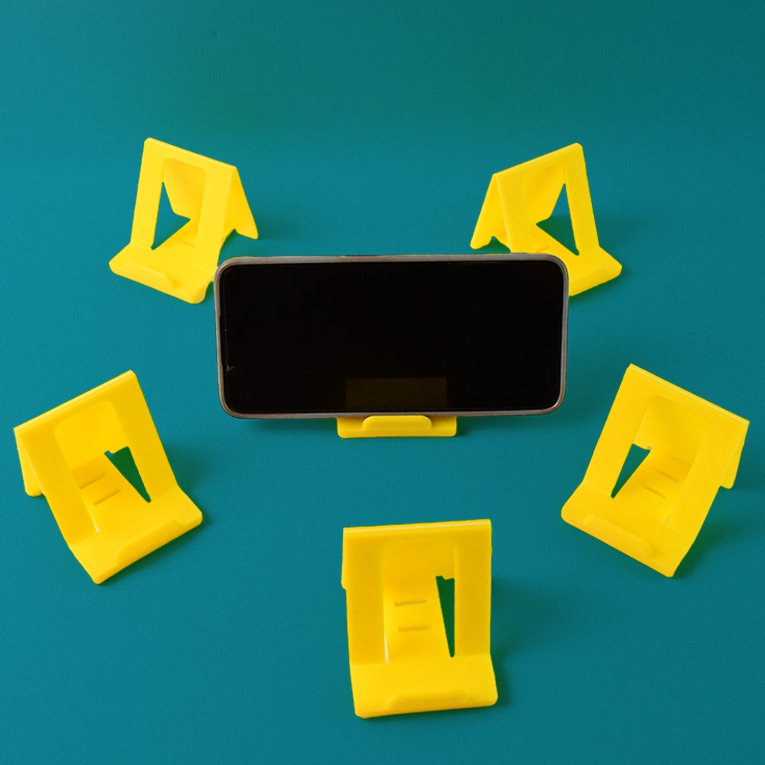 Adjustable Foldable Plastic Mobile Phone Stand (6 Pc / Mix Color) Adjustable Foldable Plastic Mobile Phone Stand (6 Pc / Mix Color)